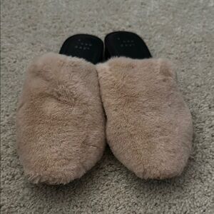 A new day fuzzy slip ons